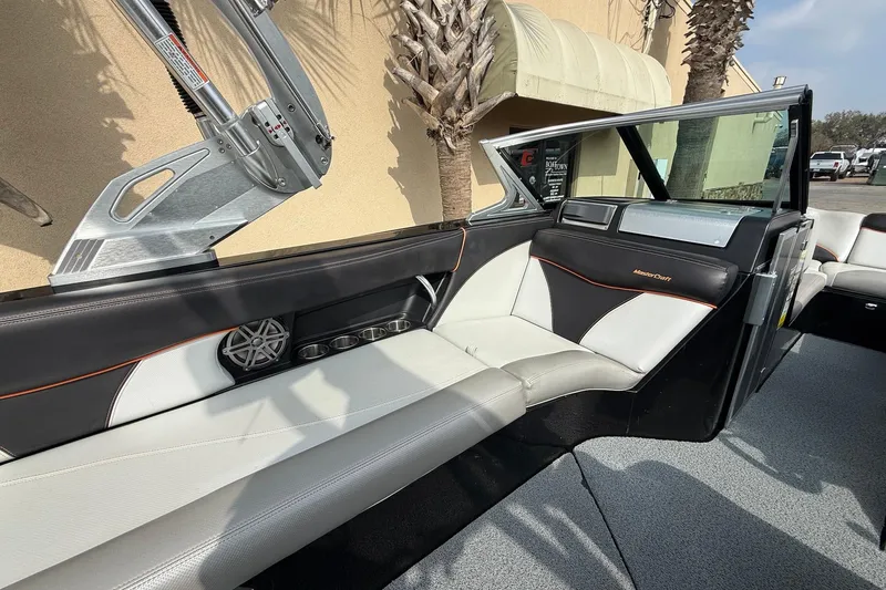 Slide: The Image of 2017 MasterCraft X46 boat interior with sleek seating and modern design elements. - 8