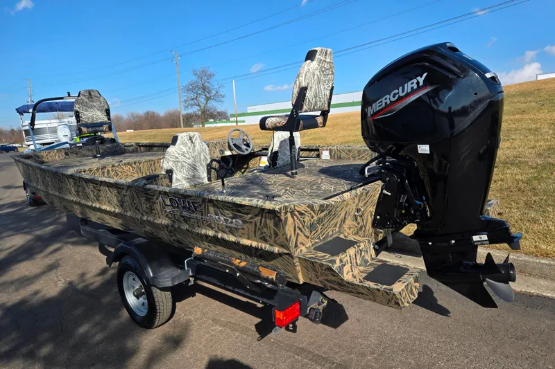 Slide: The Image of 2020 Lowe Roughneck 2070SC boat with camouflage design and Mercury outboard motor. - 3