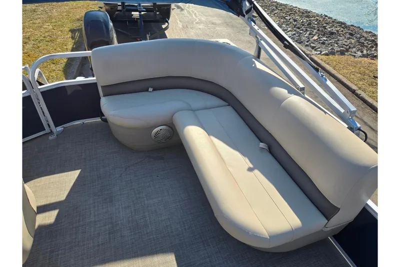 Slide: The Image of 2021 Sun Tracker Party Barge 18 DLX pontoon boat with beige seating. - 14
