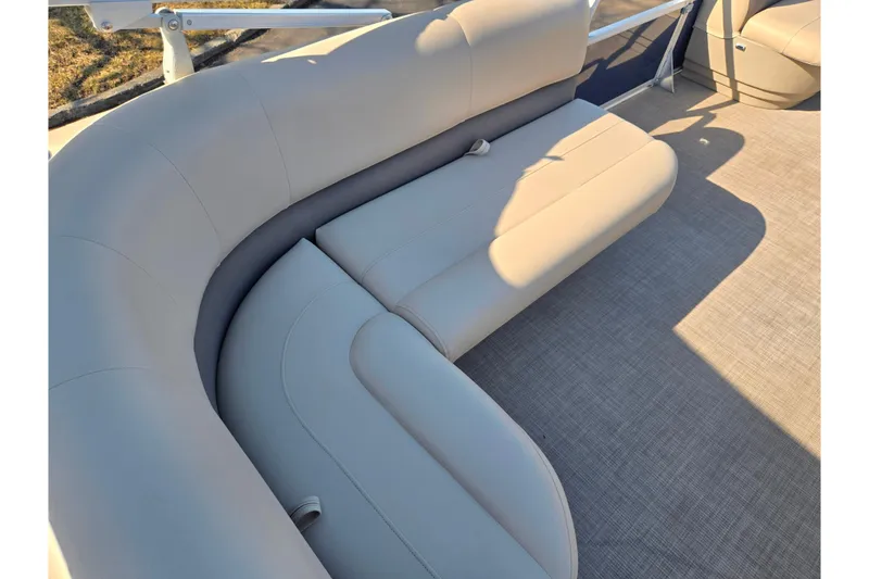Slide: The Image of 2021 Sun Tracker Party Barge 18 DLX with beige seating and spacious deck. - 16