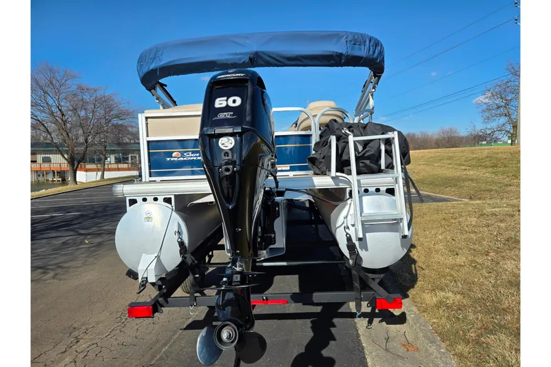 Slide: The Image of 2021 Sun Tracker Party Barge 18 DLX pontoon boat with Mercury 60 HP engine. - 2