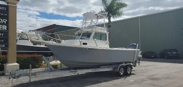 Slide: The Image of Parker Marine 2320 Sport Cabin 2019 - 1