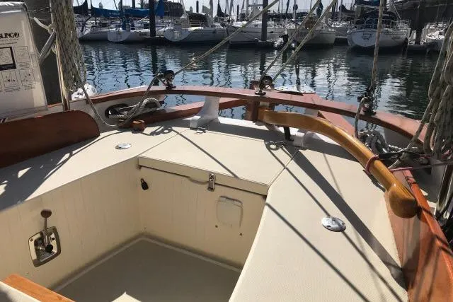 Slide: The Image of Bristol Channel Cutter 28 sailboat, 1997 model, docked in a marina with visible rigging. - 5