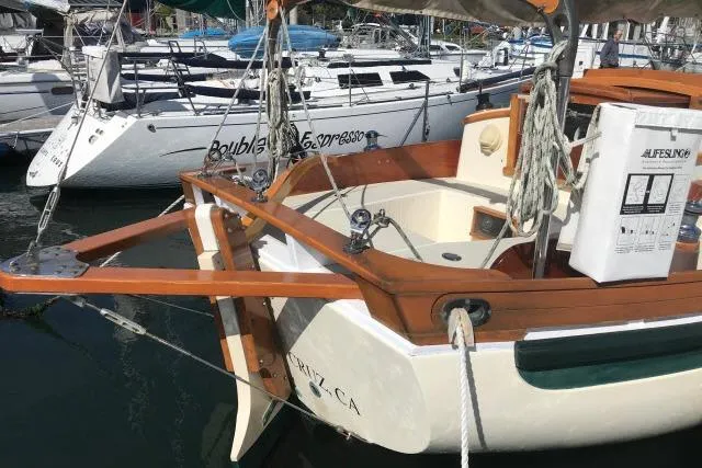 Slide: The Image of Bristol Channel Cutter 28 sailboat, 1997 model, docked in a marina. - 7