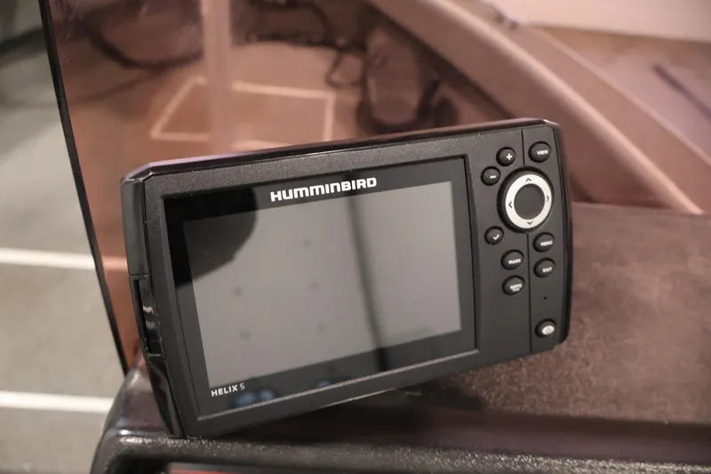 Slide: The Image of Humminbird Helix 5 fish finder on a 1990 Lowe 1620V boat dashboard. - 23