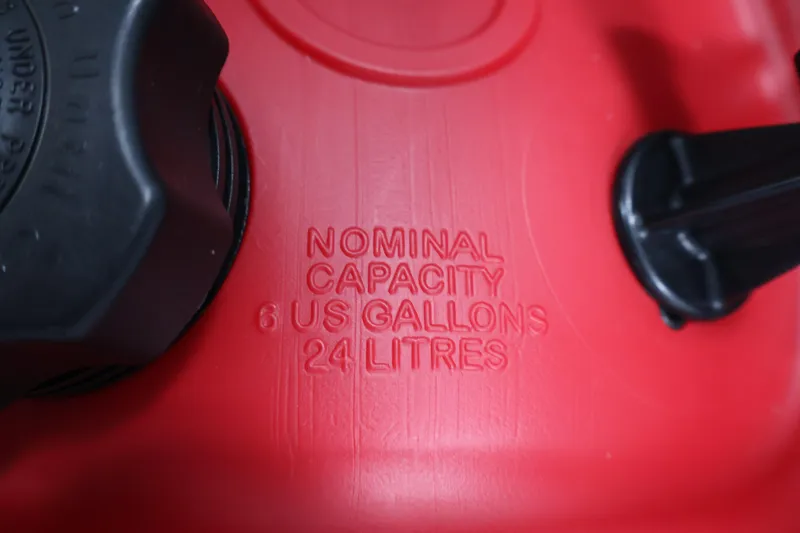 Slide: The Image of Red fuel tank with 6-gallon capacity, Lowe 1620V, 1990 model. - 36