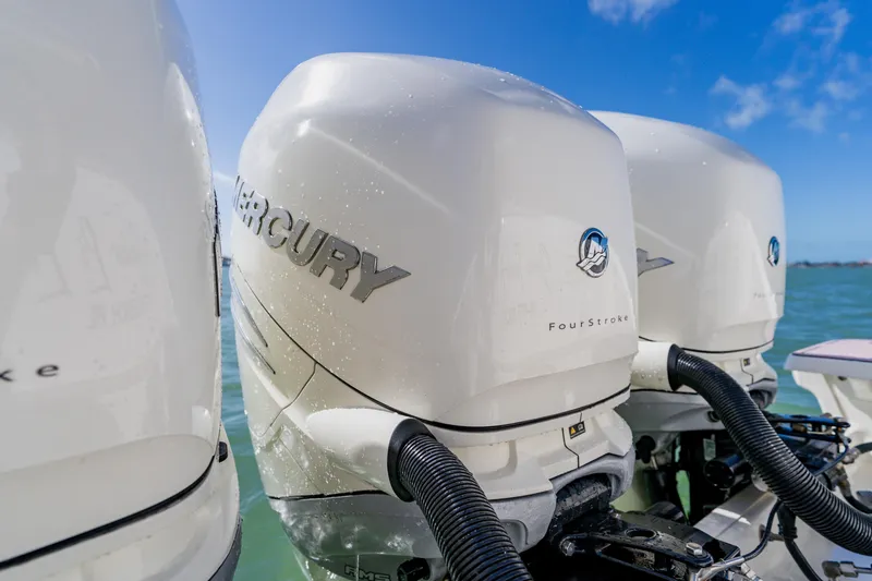 Slide: The Image of Triple Mercury FourStroke engines on a 2019 Boston Whaler 380 Outrage boat. - 34