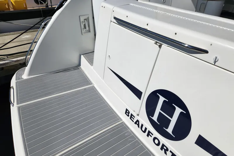Slide: The Image of 2000 Formula 41 Performance Cruiser docked in Beaufort, SC, with sleek design and spacious deck. - 12