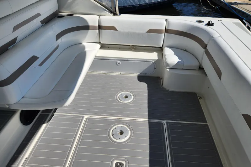 Slide: The Image of 2000 Formula 41 Performance Cruiser docked, featuring sleek design and American flag. - 16