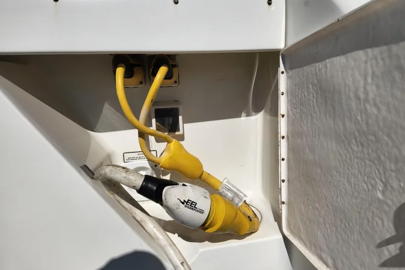 Slide: The Image of Spacious deck of 2000 Formula 41 Performance Cruiser with cushioned seating and sleek flooring. - 19