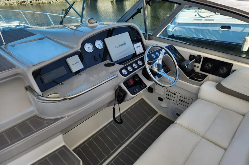 Slide: The Image of Open compartment on 2000 Formula 41 Performance Cruiser boat deck, showing interior components. - 22