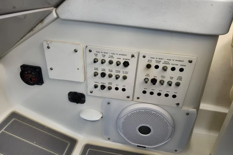 Slide: The Image of 2000 Formula 41 Performance Cruiser interior with helm, seating, and water view. - 24