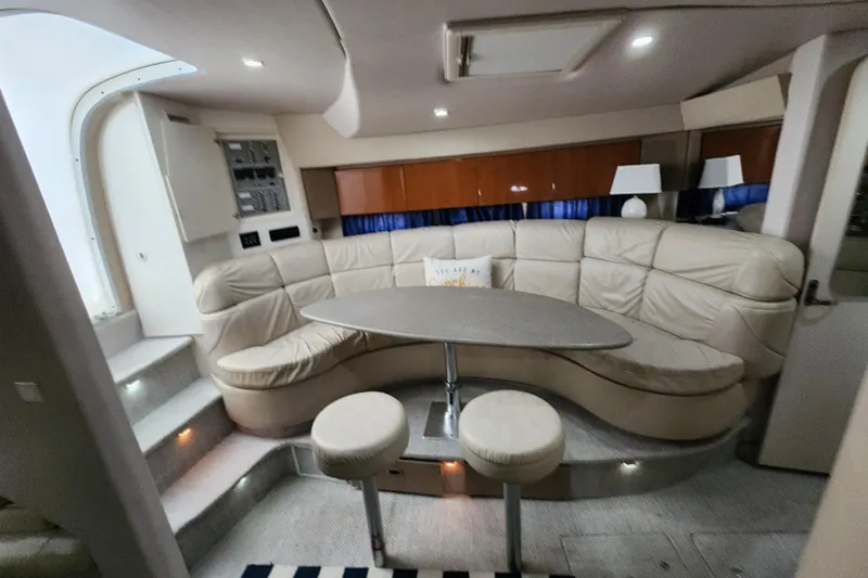 Slide: The Image of 2000 Formula 41 Performance Cruiser with American flag at marina. - 31