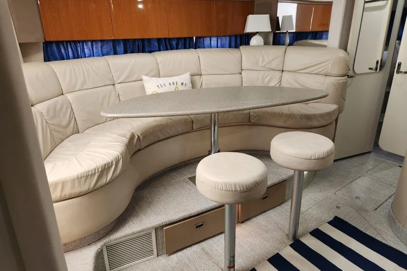 Slide: The Image of Interior of 2000 Formula 41 Performance Cruiser with modern amenities and cozy seating. - 32