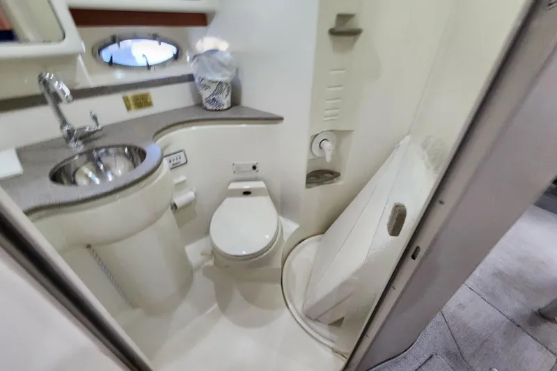 Slide: The Image of Interior of 2000 Formula 41 Performance Cruiser kitchen with wood cabinets and modern appliances. - 35