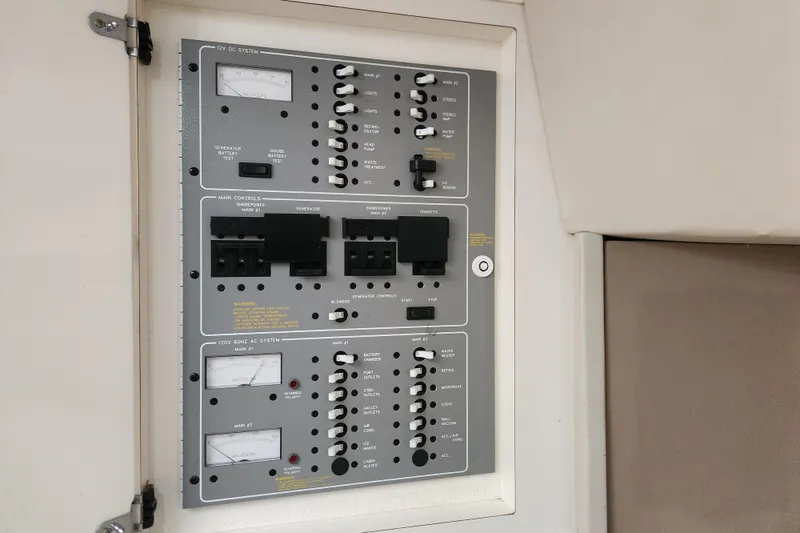 Slide: The Image of Shower area in 2000 Formula 41 Performance Cruiser boat, featuring white interior. - 40