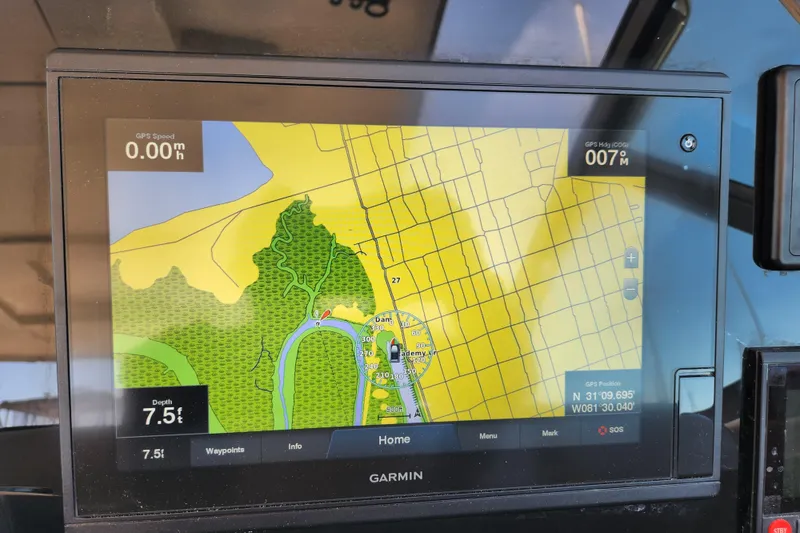 Slide: The Image of Garmin GPS display on 2000 Formula 41 Performance Cruiser showing map and navigation details. - 50