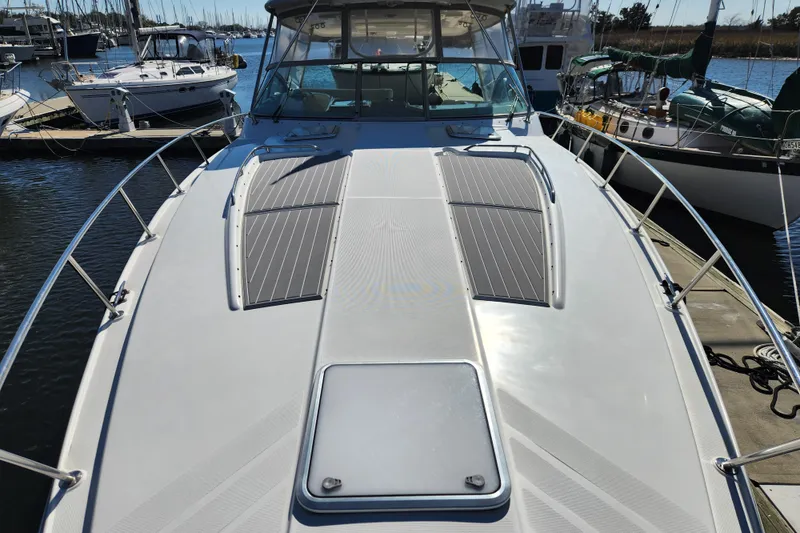 Slide: The Image of Bow of 2000 Formula 41 Performance Cruiser with coiled rope on deck. - 7