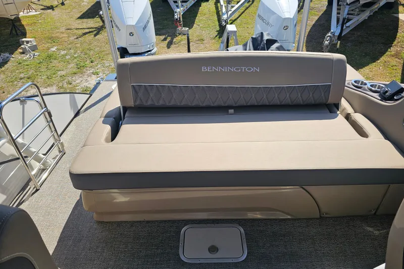 Slide: The Image of 2025 Bennington QX 27 QXSBWA X2 Swingback boat interior with cushioned seating. - 17