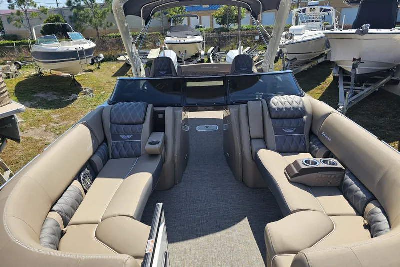Slide: The Image of 2025 Bennington QX 27 QXSBWA X2 Swingback luxury boat interior with plush seating. - 27