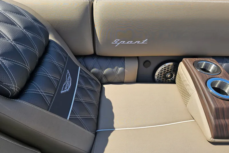 Slide: The Image of Luxurious interior of 2025 Bennington QX 27 QXSBWA X2 Swingback with quilted seats and cup holders. - 31
