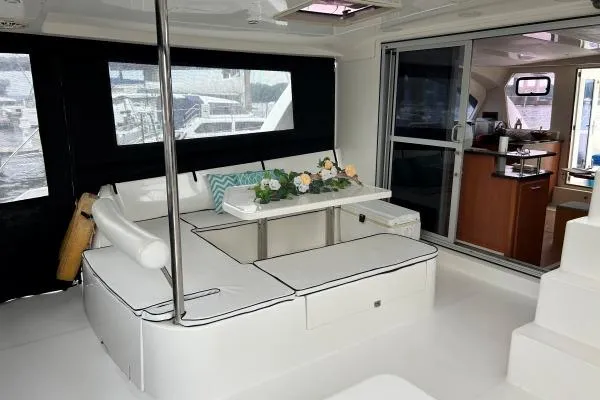 Slide: The Image of Luxurious interior of 2014 Leopard 44 catamaran with elegant seating and dining area. - 19