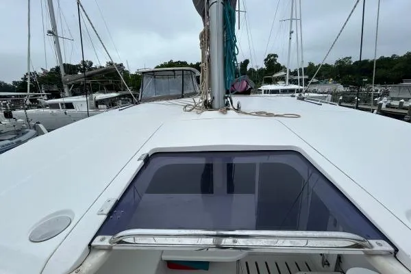 Slide: The Image of 2014 Leopard 44 catamaran deck view with marina background. - 23
