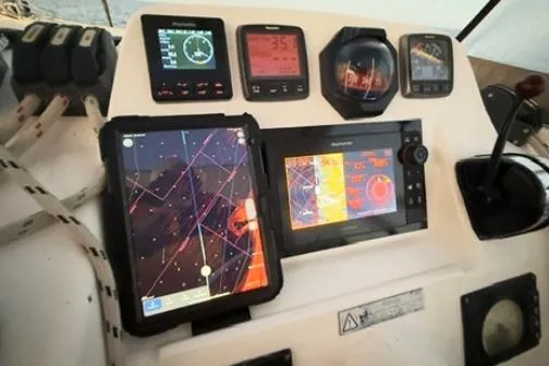 Slide: The Image of Control panel of a 2014 Leopard 44 yacht with navigation instruments. - 29