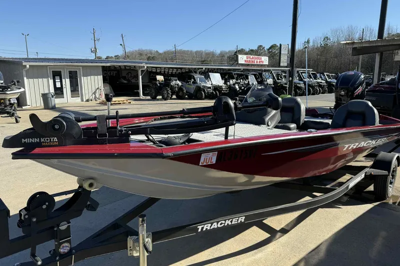 Slide: The Image of 2021 Tracker Pro Team 190 TX boat on trailer, featuring Minn Kota Maxxum motor. - 6