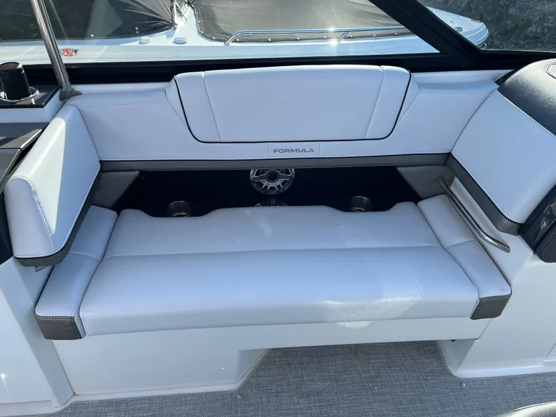 Slide: The Image of 2024 Formula 330 CBR boat seating area with white upholstery. - 6