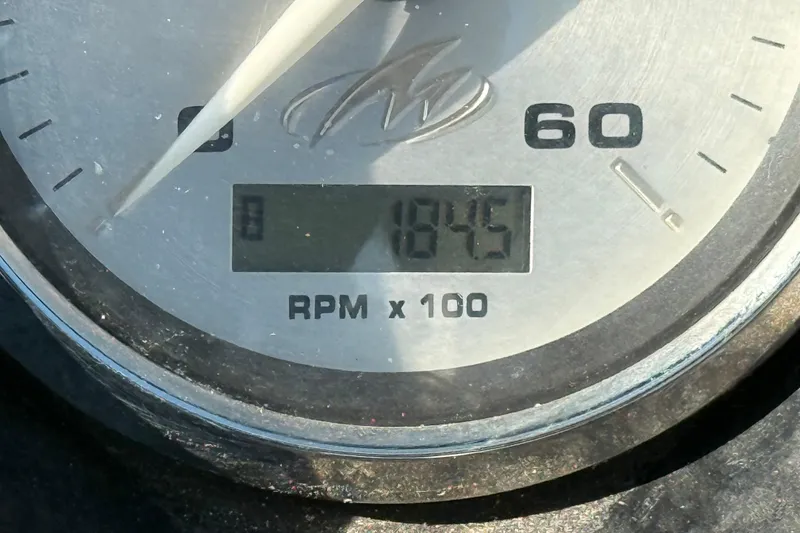 Slide: The Image of Close-up of a 2011 Monterey 264 FS tachometer showing 1845 RPM. - 14