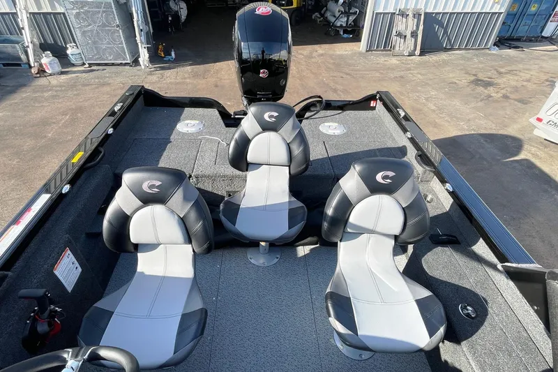 Slide: The Image of 2026 Crestliner 1750 Fish Hawk WT JS boat interior with steering wheel and dashboard. - 3