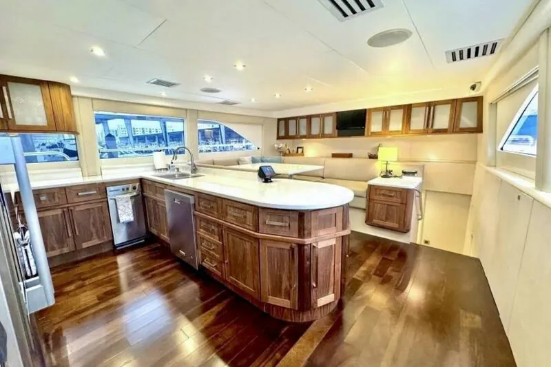 Slide: The Image of Luxurious interior of 2001 Lazzara 94 Motor Yacht with elegant wood cabinetry and modern amenities. - 18
