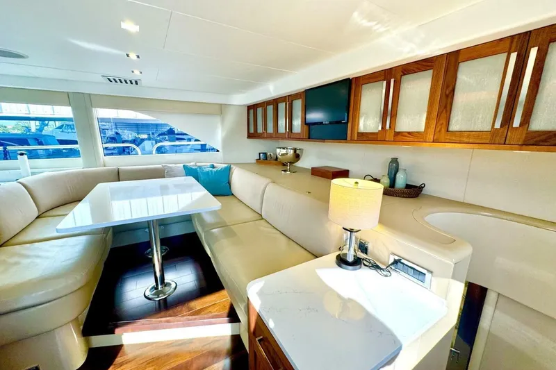 Slide: The Image of Luxurious interior of 2001 Lazzara 94 Motor Yacht with elegant seating and modern decor. - 20
