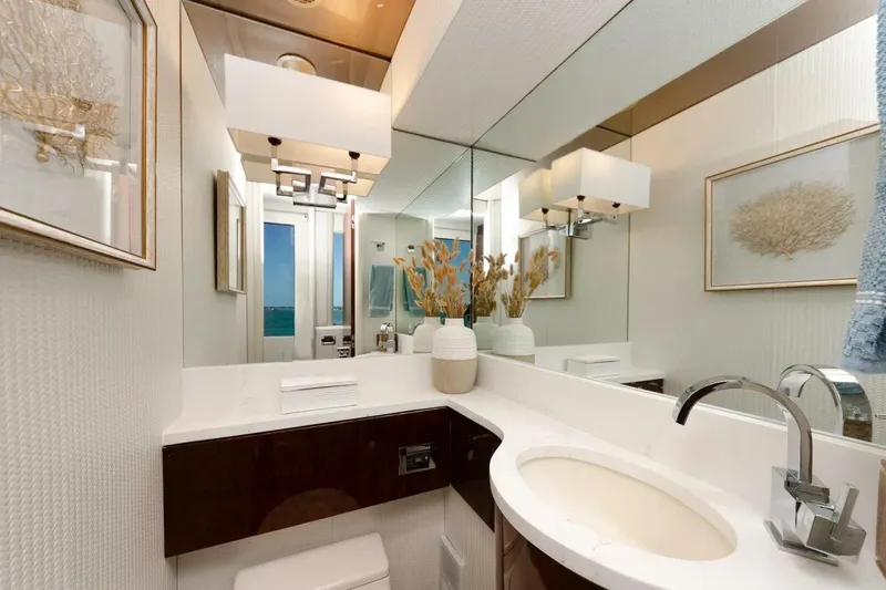 Slide: The Image of Luxurious bathroom on 2001 Lazzara 94 Motor Yacht with elegant decor and modern fixtures. - 21