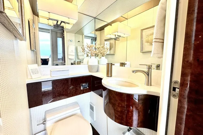 Slide: The Image of Luxurious bathroom in 2001 Lazzara 94 Motor Yacht with elegant fixtures and decor. - 22