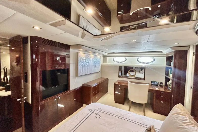 Slide: The Image of Luxurious interior of 2001 Lazzara 94 Motor Yacht with elegant wood finishes and modern amenities. - 27