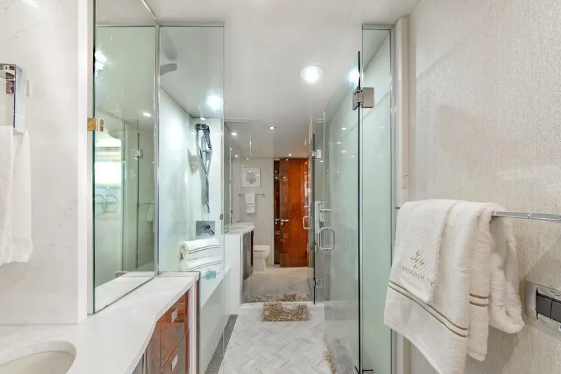 Slide: The Image of Luxurious bathroom on 2001 Lazzara 94 Motor Yacht with glass shower and elegant decor. - 35