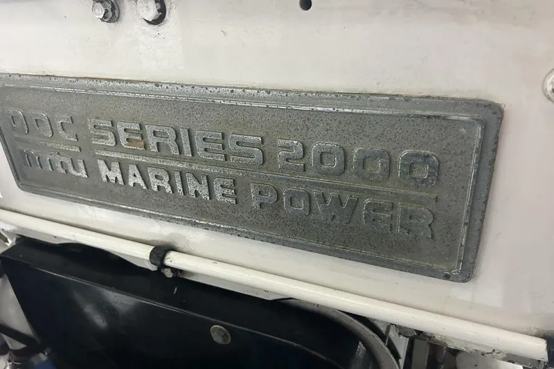 Slide: The Image of Plaque displaying "DDC Series 2000 MTU Marine Power" on a 2001 Lazzara 94 Motor Yacht. - 63