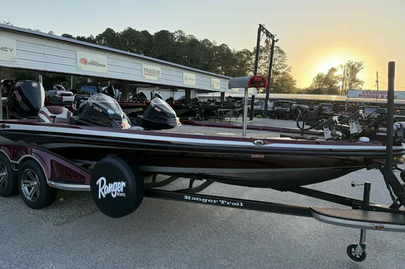 Slide: The Image of 2018 Ranger Z520L boat on trailer at sunset, dealership background. - 0