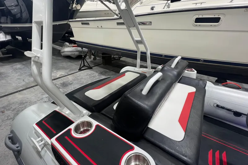 Slide: The Image of 2025 Highfield Velox 420 boat interior with sleek seating and modern design elements. - 10