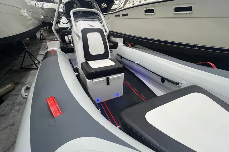 Slide: The Image of 2025 Highfield Velox 420 boat interior with sleek seating and modern design. - 17