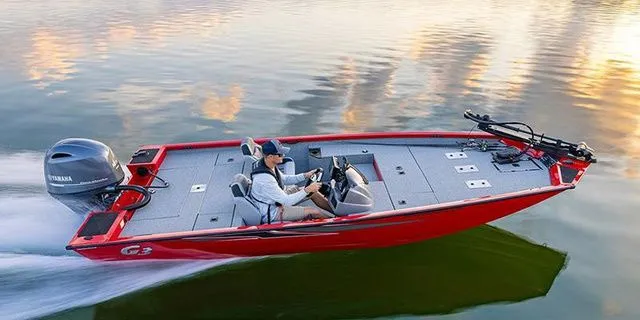 The Image of Red G3 Sportsman 1810 PFX boat with Yamaha 115 engine on calm water. - 1