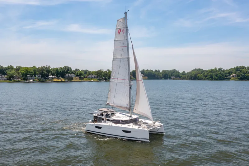 Slide: The Image of Fountaine Pajot Astrea 42 Catamaran sailing on calm water, 2019 model. - 14