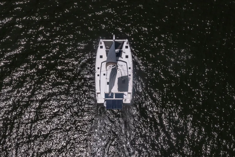 Slide: The Image of Aerial view of Fountaine Pajot Astrea 42 Catamaran on water. - 15