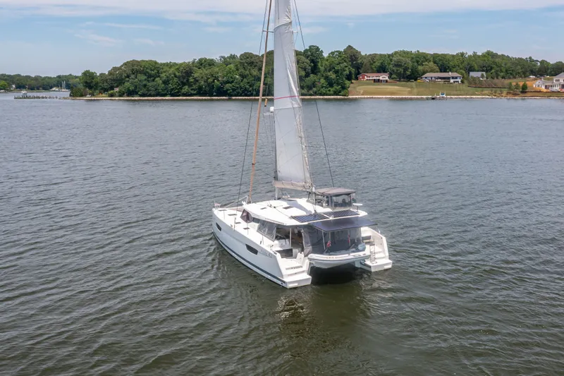 Slide: The Image of 2019 Fountaine Pajot Astrea 42 catamaran on calm water. - 18