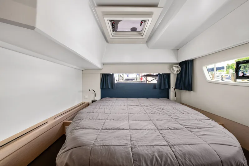 Slide: The Image of Interior of Fountaine Pajot Astrea 42, cozy bedroom with window. - 21