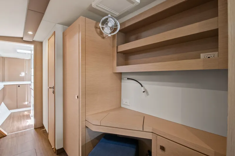 Slide: The Image of Interior of 2019 Fountaine Pajot Astrea 42 Catamaran with wooden shelves. - 28