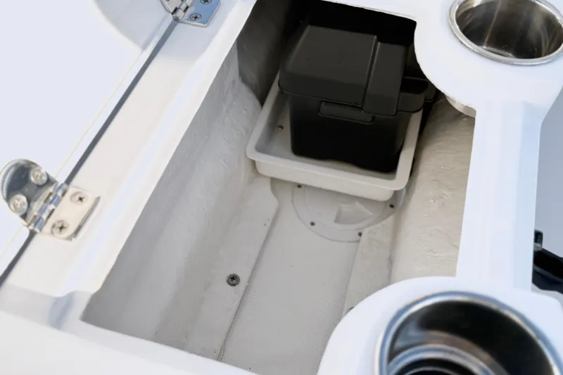 Slide: The Image of Storage compartment of 2021 Walker Bay Generation 10 LTE boat with cup holders. - 14