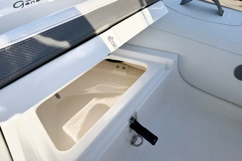 Slide: The Image of Open storage compartment on 2021 Walker Bay Generation 10 LTE boat. - 15